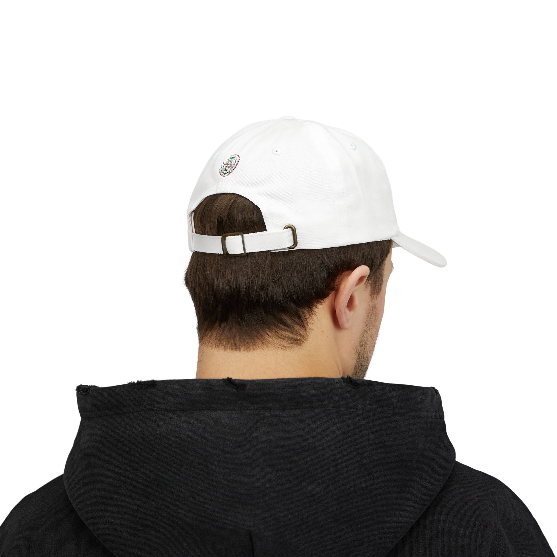 Person wearing a white cap with a logo on the back, facing away from the camera.