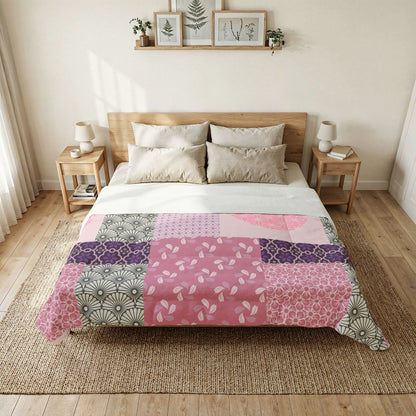 Bedroom with a bed featuring a patchwork quilt and wooden headboard. Cotton Heritage