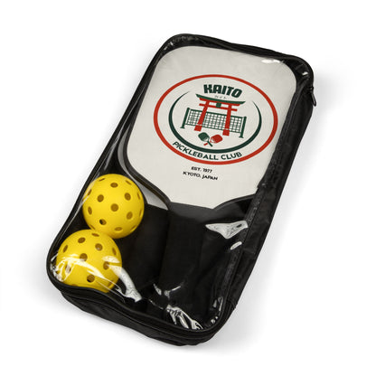 Kaito Pickleball Club package with two yellow pickleballs and a paddle on a white background