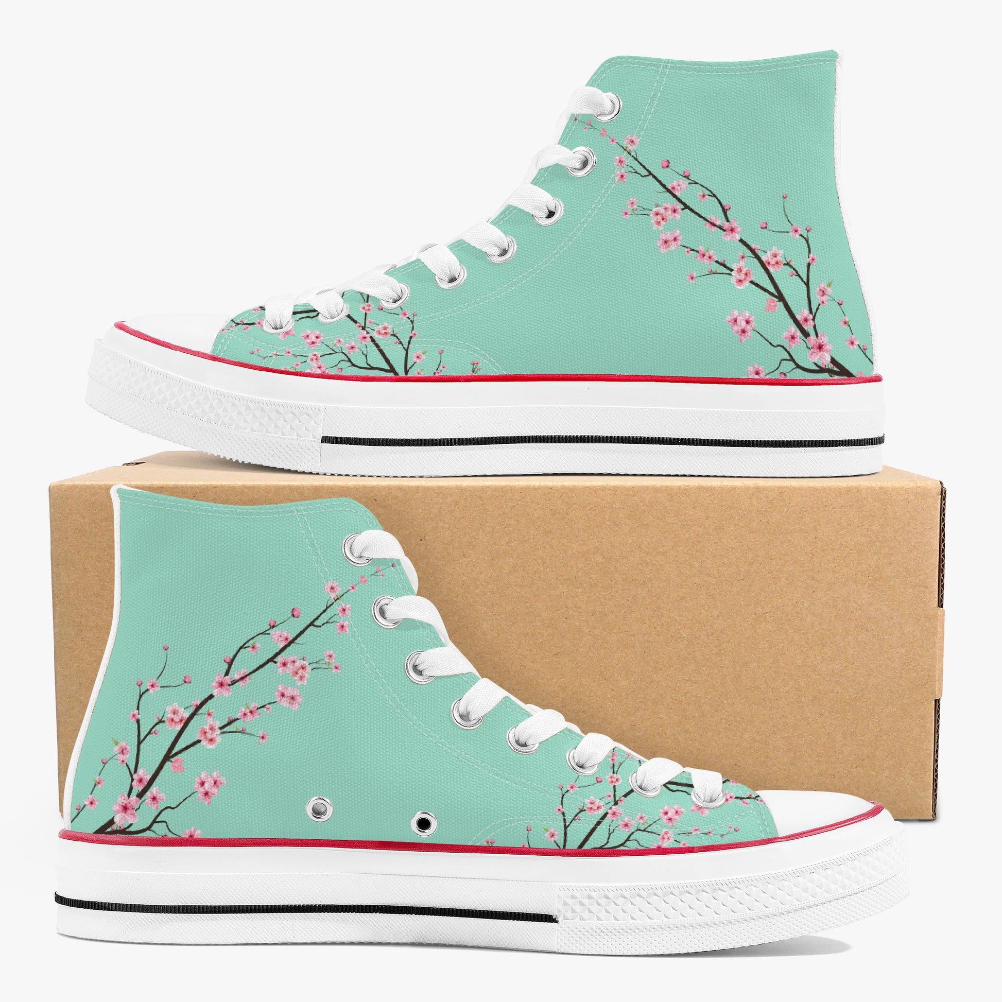 Teal high-top sneakers with cherry blossom design on a white background