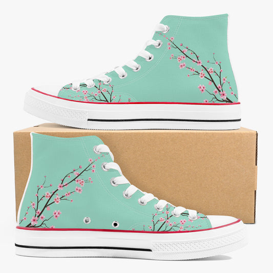 Teal high-top sneakers with cherry blossom design on a white background