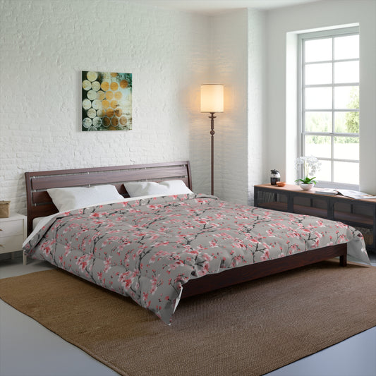 Bedroom with a bed, lamp, and artwork on a white wall.