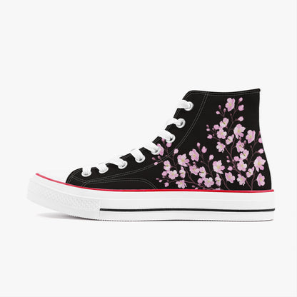 Black high-top sneaker with pink floral pattern on a white background