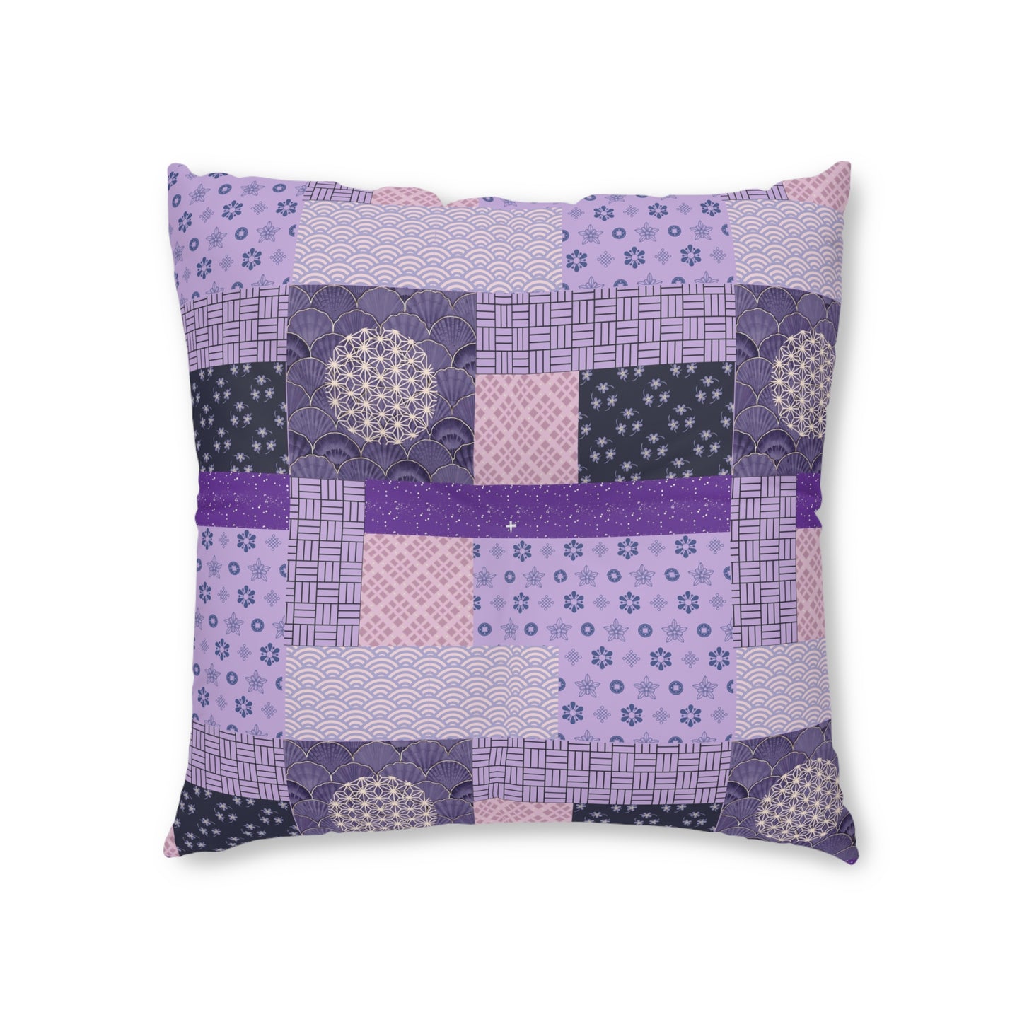 A square decorative throw pillow featuring a patchwork quilted design in shades of purple, pink, and navy with various Japanese-inspired patterns, shown against a plain white background.
