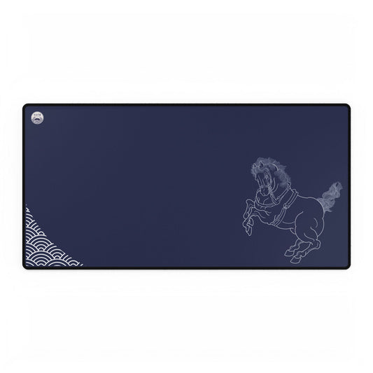 A deep indigo desk mat featuring white line art of a rearing Shinme horse and Seigaiha wave patterns, organized for a clean workspace aesthetic.