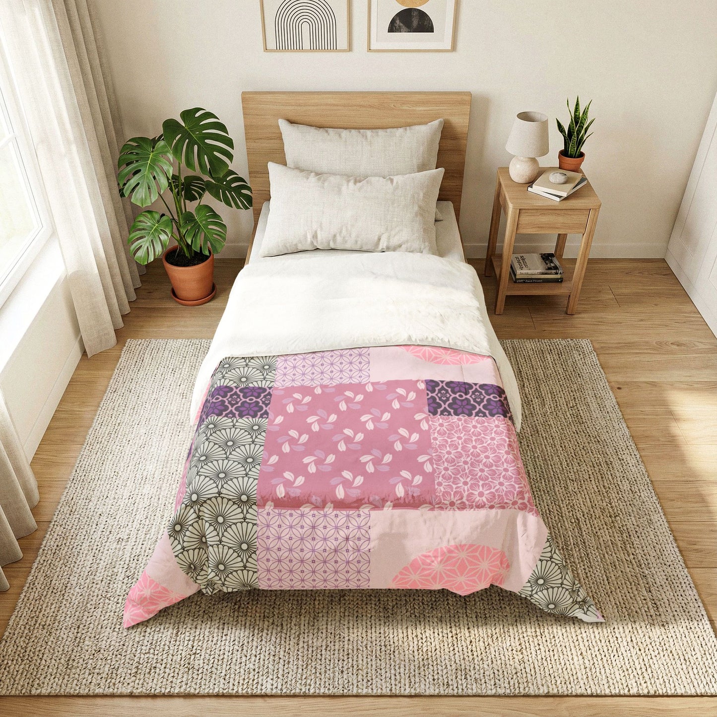 Bedroom with a bed featuring a patchwork quilt, nightstand, and decor items. Cotton Heritage