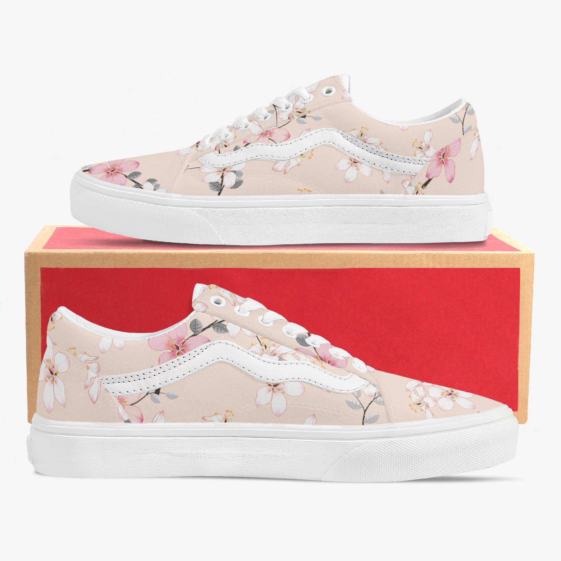 Floral-patterned sneakers on a red box with a white background