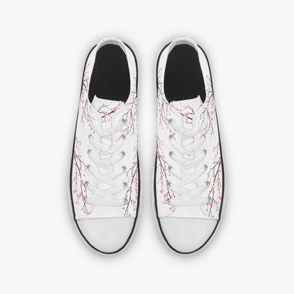 White sneakers with floral design on a white background