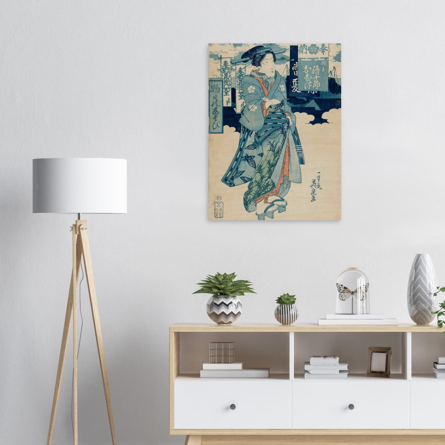Room interior with a lamp, cabinet, and decorative items, featuring a large wall art piece.