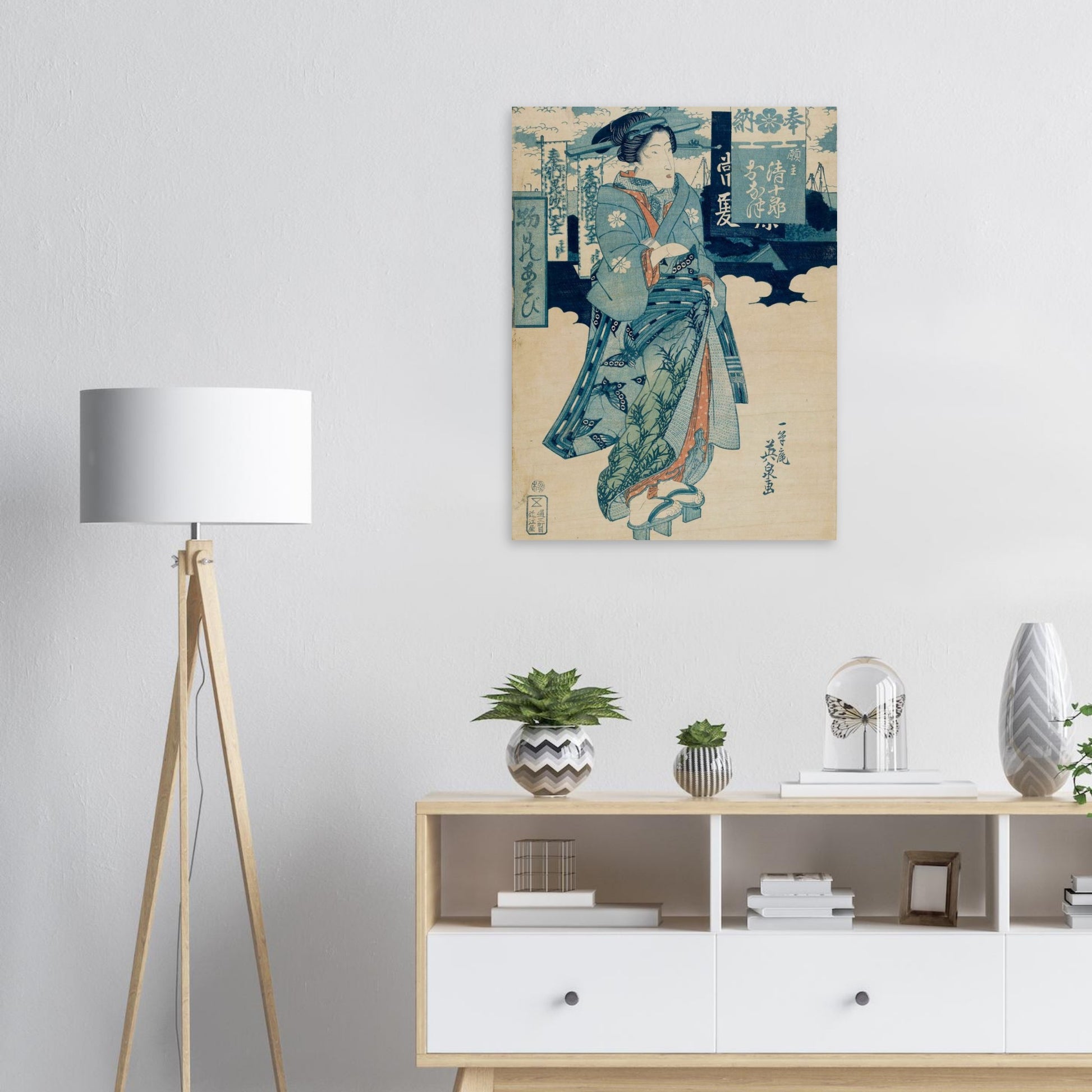 Room interior with a lamp, cabinet, and decorative items, featuring a large wall art piece.