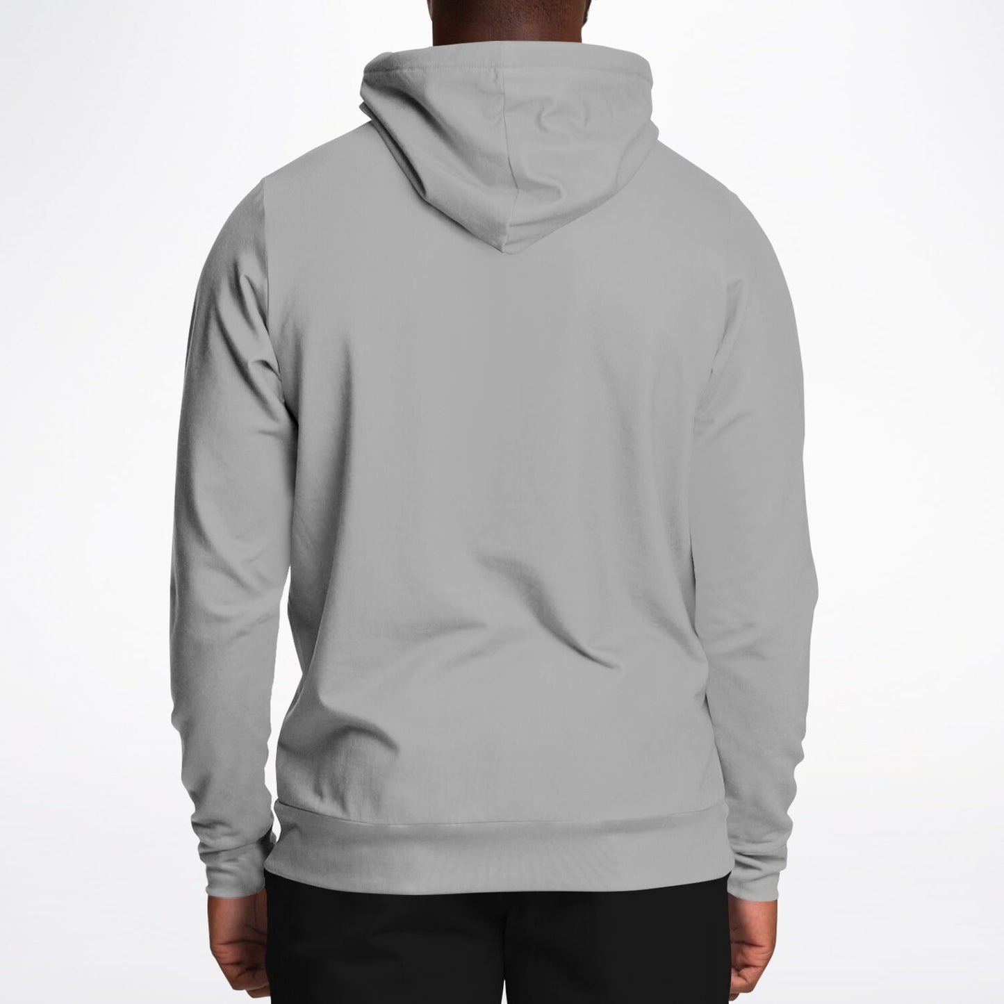 A person viewed from the back wearing a plain light gray pullover hoodie with black pants, against a clean white studio background.