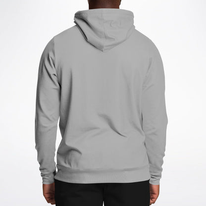 A person viewed from the back wearing a plain light gray pullover hoodie with black pants, against a clean white studio background.