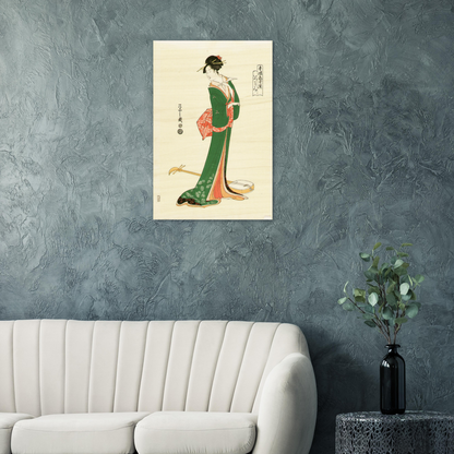 Japanese artwork of a woman in traditional attire on a gray wall above a white sofa.