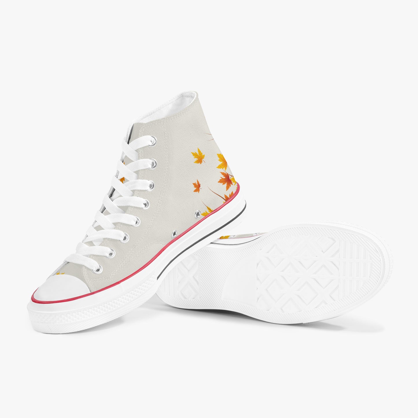 A pair of high-top canvas sneakers in light gray, featuring a white rubber toe cap, white laces, a thin red stripe along the midsole, and a small orange and yellow autumn leaf print near the heel.