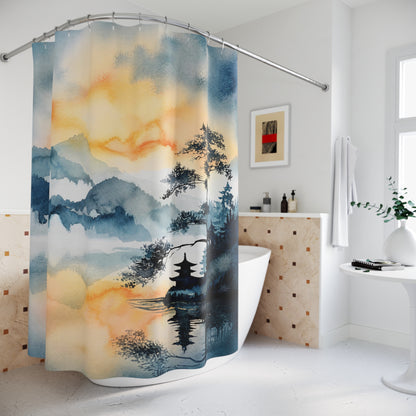 A fabric shower curtain featuring an elegant watercolor-style landscape print with misty mountains, trees, and a pagoda over reflective water, shown hanging in a bright, modern white bathroom.
