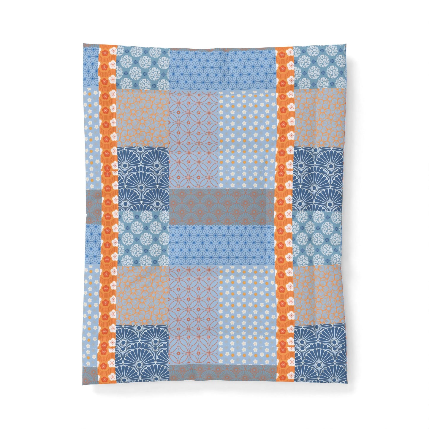 Patterned fabric with blue, orange, and gray colors on a white background. Heritage Cotton