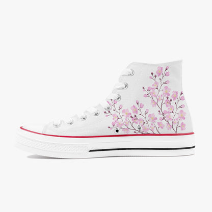 White high-top sneaker with pink floral design on a white background