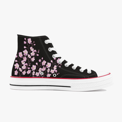 Black high-top sneaker with pink floral design on a white background