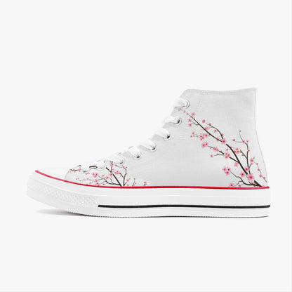 White high-top sneaker with cherry blossom design on a white background