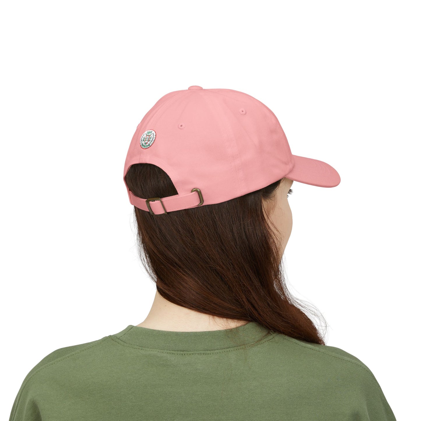 Person wearing a pink cap from behind on a white background