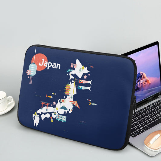 Navy blue laptop sleeve with Japan map design next to a laptop on a light gray background