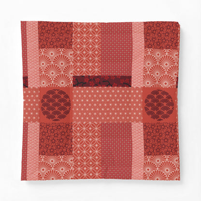Red and white patterned fabric on a white background. Cotton Heritage