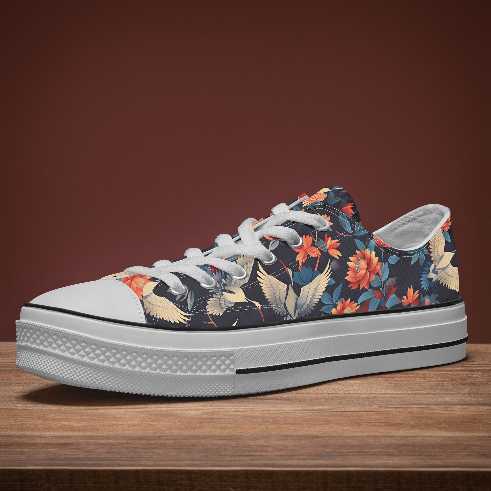 Floral patterned sneaker on a wooden surface with a brown background