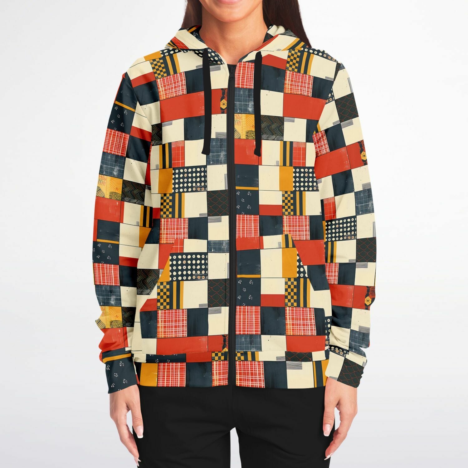 Person wearing a colorful patchwork shirt on a white background