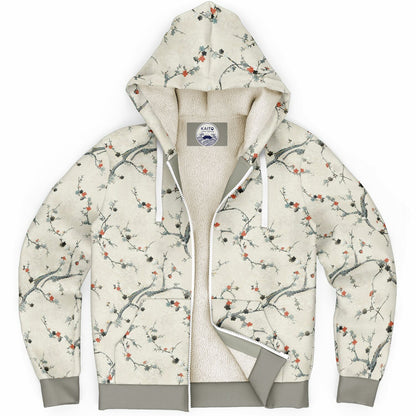 A zip-up hoodie with a beige and white floral branch print, featuring a soft cream fleece lining and gray ribbed cuffs and hem.