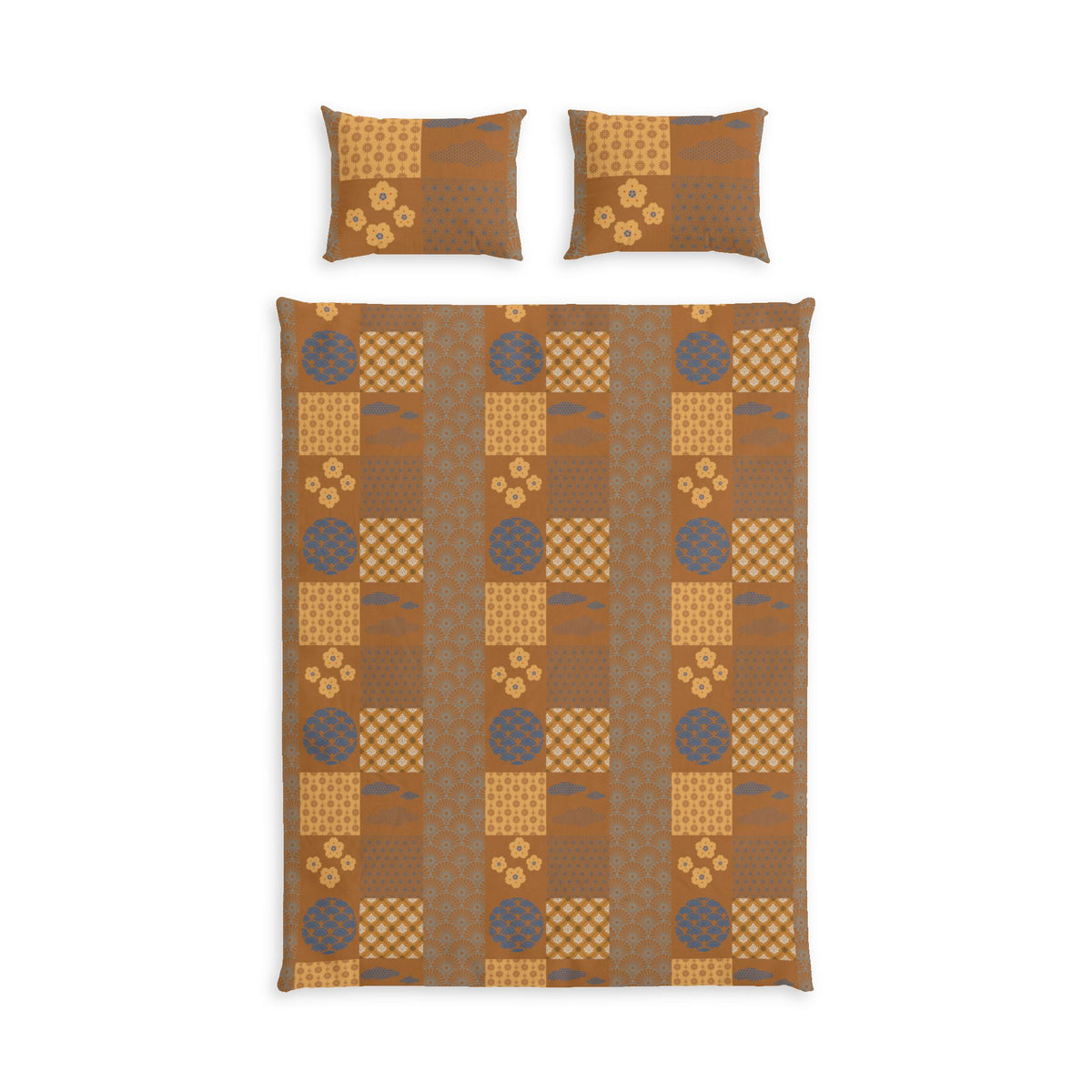 A bedding set featuring a patchwork quilt and two matching pillowcases in earthy brown, tan, and muted blue-gray tones, displayed on a clean white background.