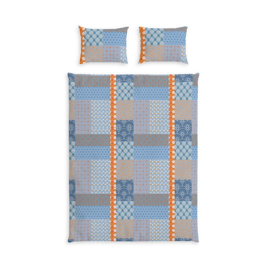 A patchwork quilt set featuring a blue, gray, and beige geometric patchwork design with orange dotted vertical borders, shown with two matching pillowcases on a white background.