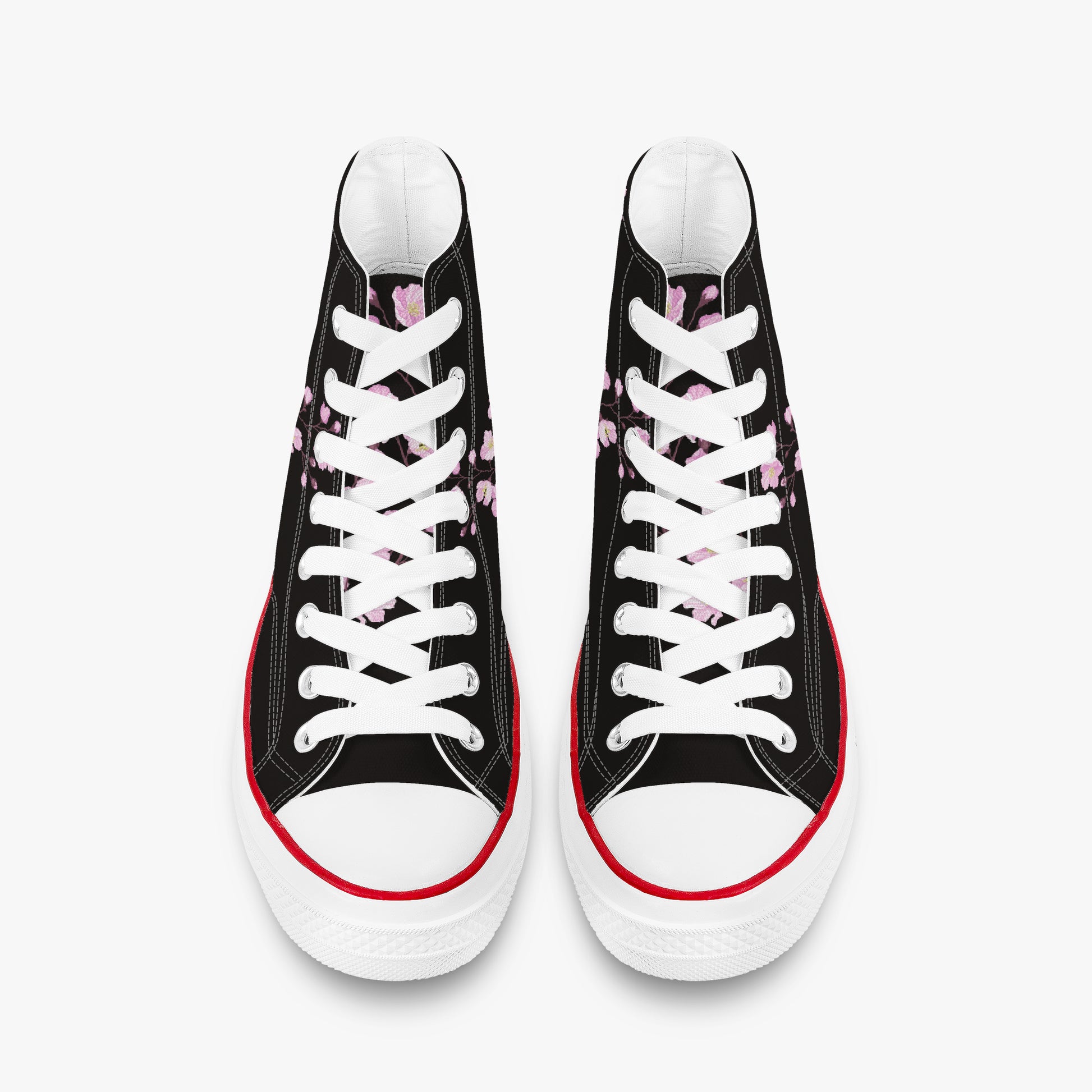 Black high-top sneakers with white laces and red soles on a white background