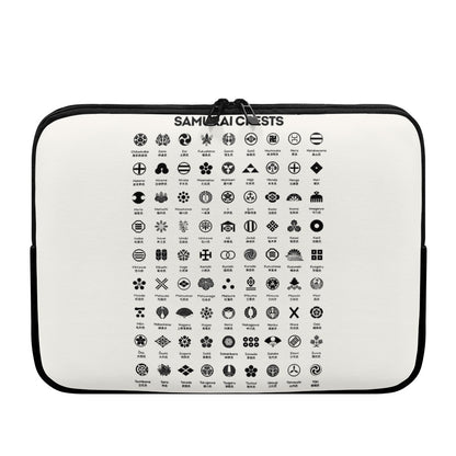 Samurai crests and Hiragana chart printed on a protective laptop sleeve