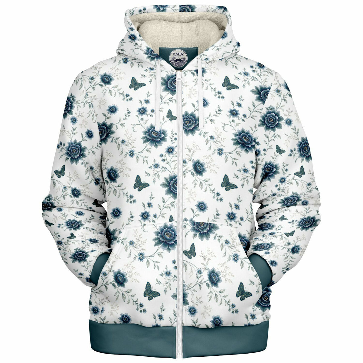 A white zip-up hoodie featuring a blue floral and butterfly pattern, with a solid teal hem and cuffs, and a cream-colored hood lining.