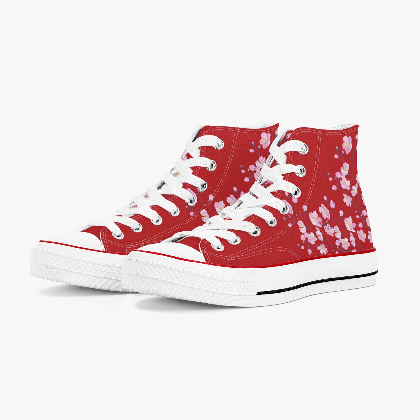Red high-top sneakers with white floral pattern on a white background