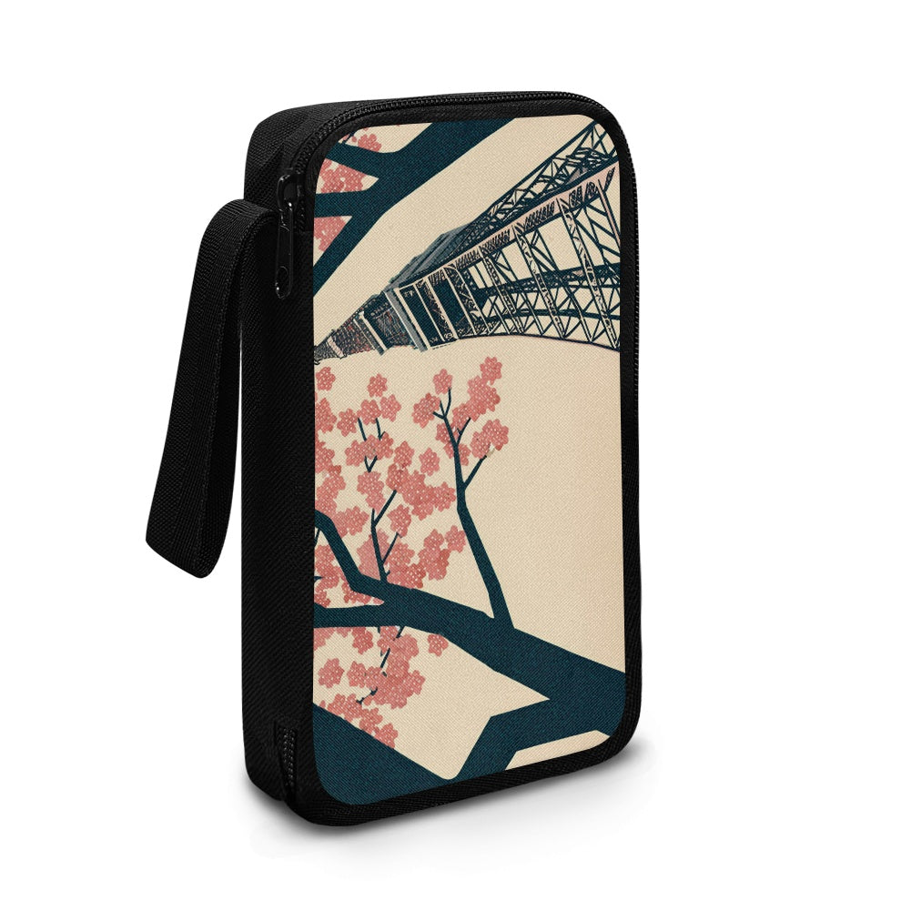 Pouch with Tokyo Tower and cherry blossom design on a white background