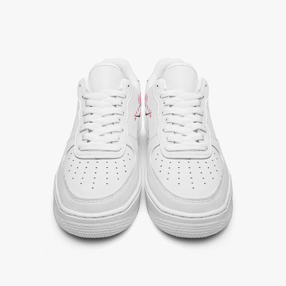 Pair of white sneakers on a light gray background