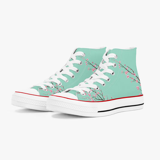 Teal high-top sneakers with floral design on a white background