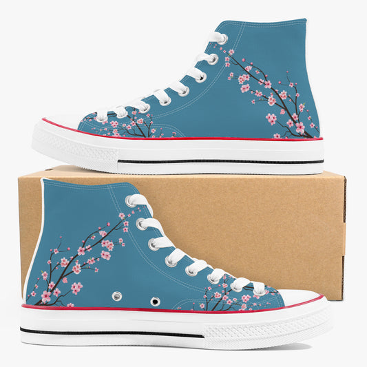Blue high-top sneakers with floral design on a cardboard box