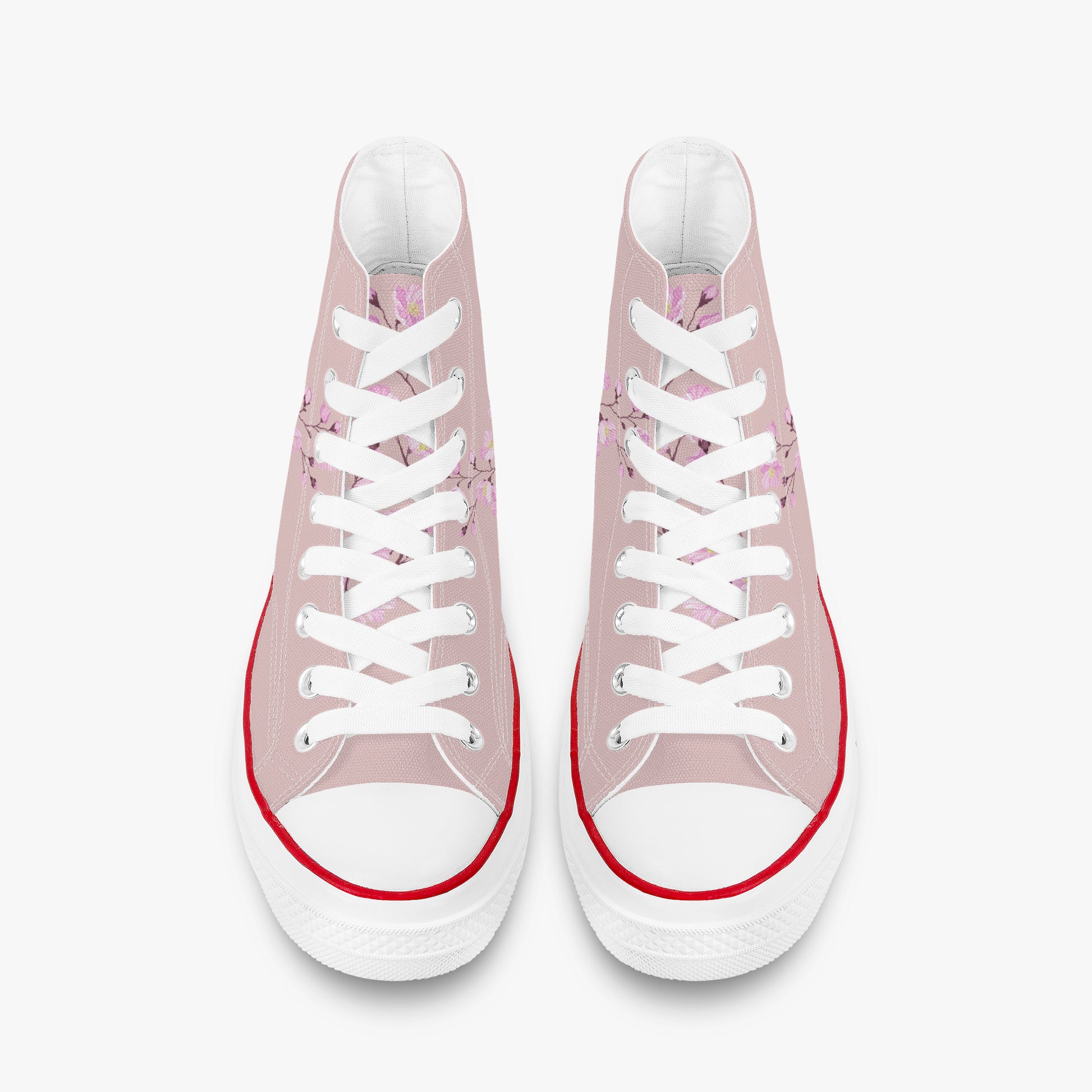Pink high-top sneakers with white laces on a white background