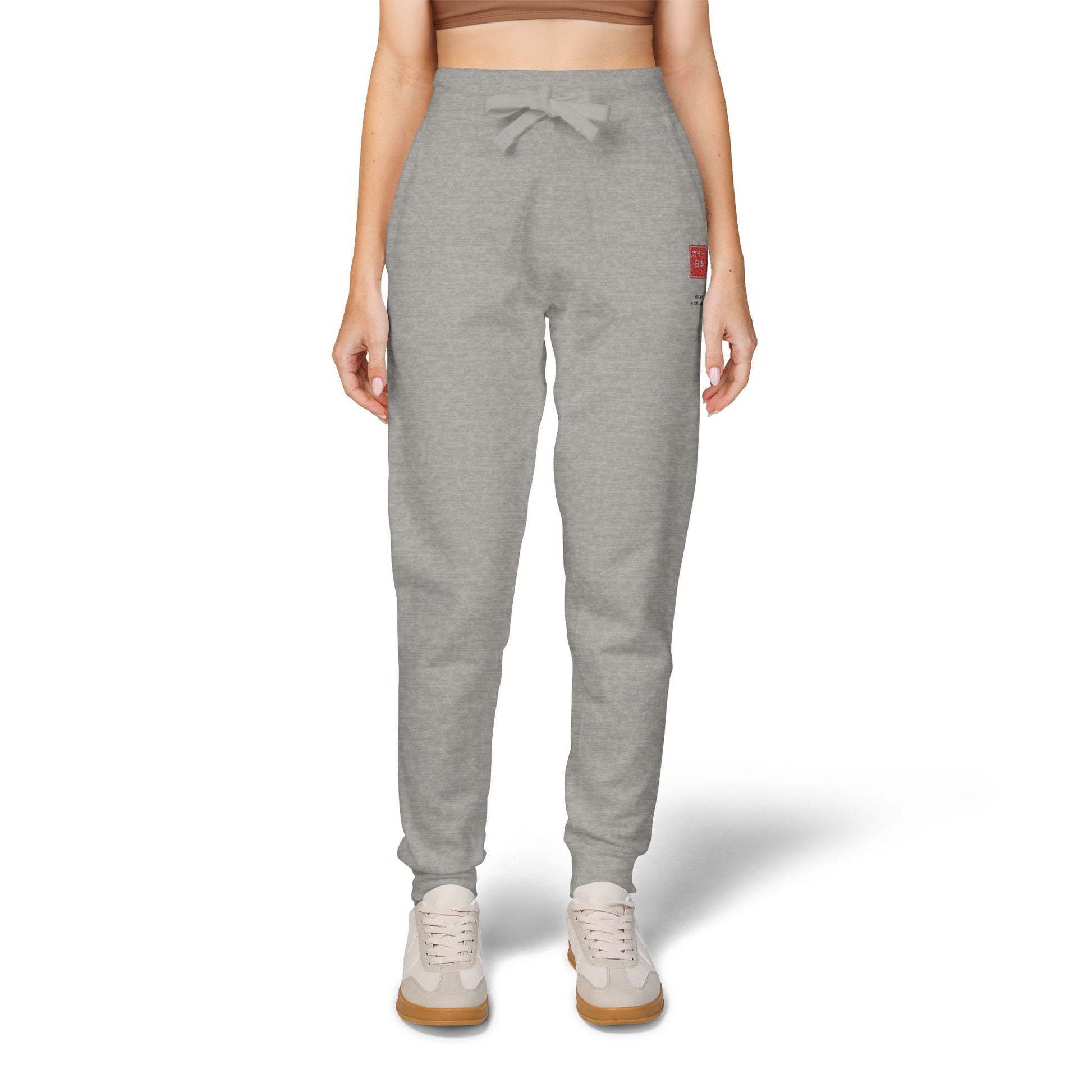 Gray sweatpants with red text on a white background