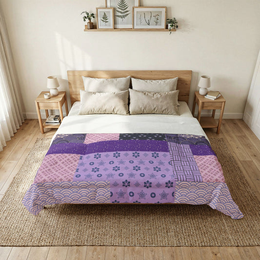 Bedroom with a bed featuring a patchwork quilt, two nightstands, and framed pictures on the wall. Heritage Cotton