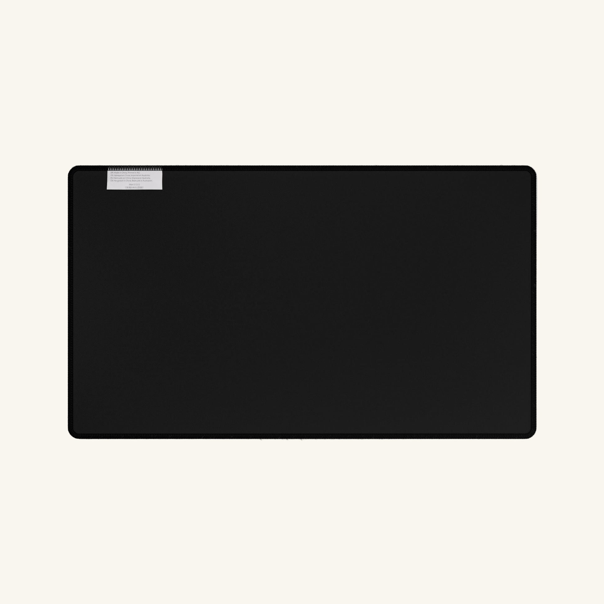 Black rectangular object with a silver accent on a white background