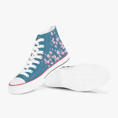 Blue high-top sneakers with pink floral pattern on a white background