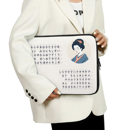 Person holding a laptop sleeve with a design of a geisha and hiragana.
