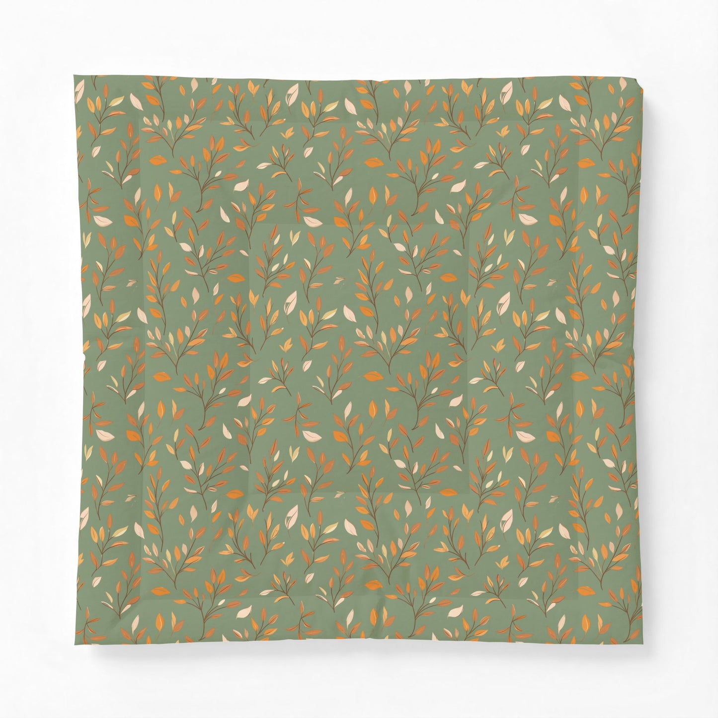 A square fabric item, likely a pillowcase or scarf, featuring an all-over botanical pattern of delicate branches and leaves in warm gold, brown, and cream tones on a muted sage green background.