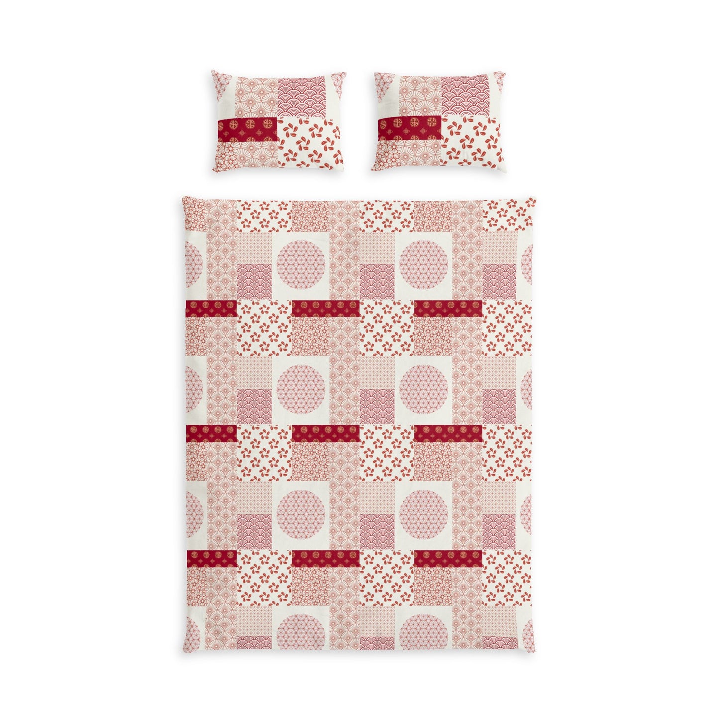 A bedding set featuring a duvet cover and two matching pillowcases with a patchwork quilt pattern in shades of pink, red, and white.