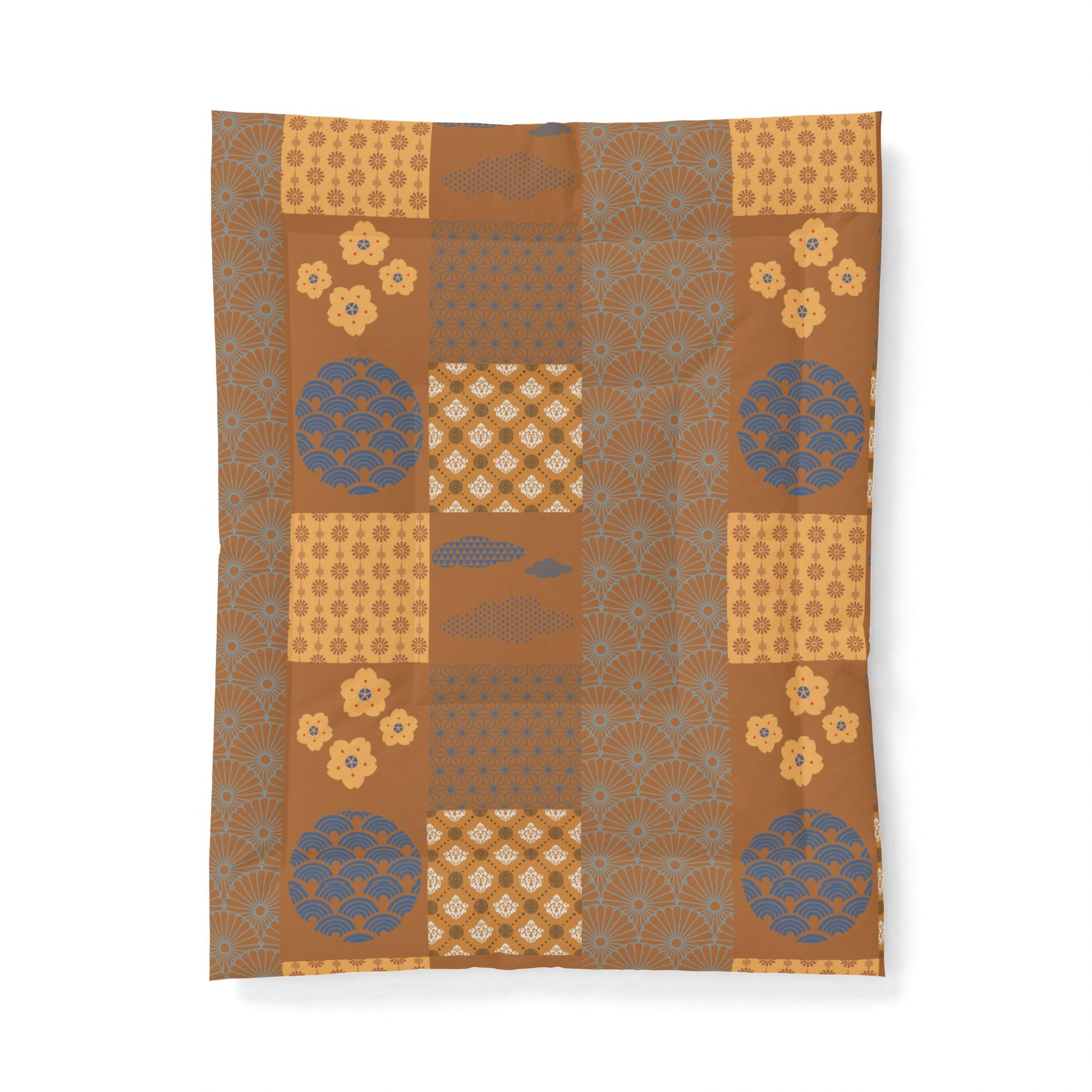 Patterned fabric with geometric shapes and floral elements on a brown background. Heritage Cotton