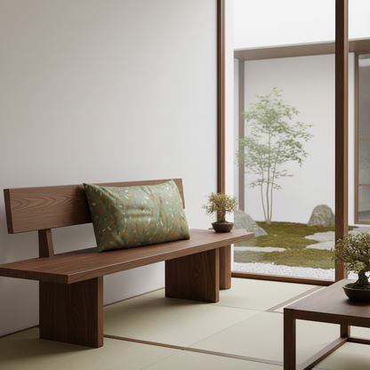 A minimalist Japanese-style wooden bench with a green patterned cushion, set in a serene room with a tatami floor and a large window overlooking a small garden courtyard.