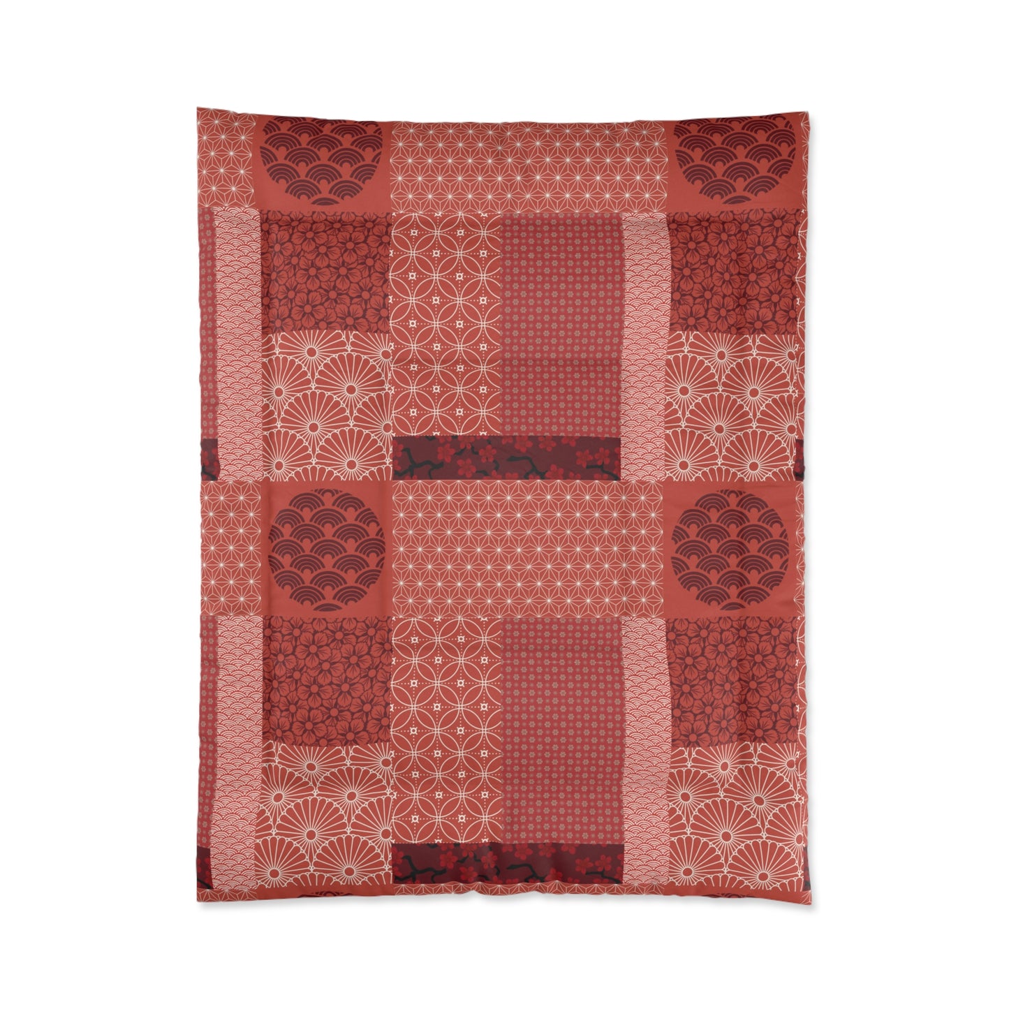 Red patterned fabric with a patchwork design on a white background